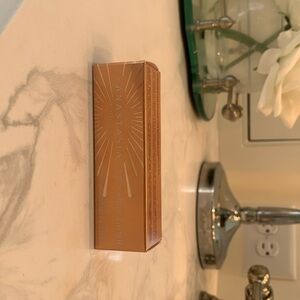 Anastasia Beverly Hills stick highlighter in color “iced out”